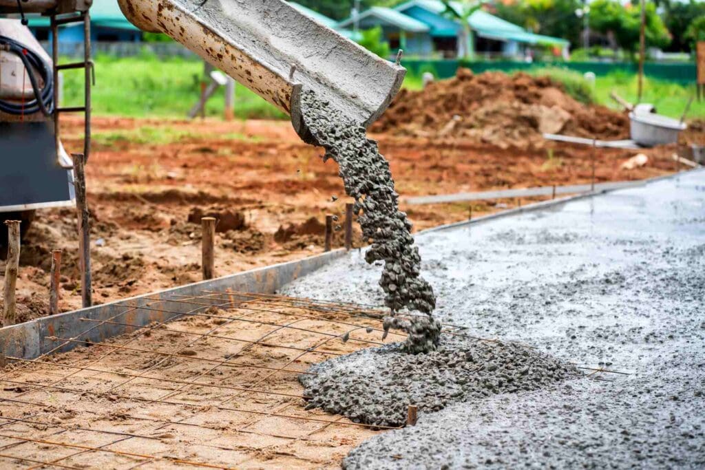 Essential Elements For A Concrete Sidewalk 1 concrete mix pouring to create a concrete sidewalk